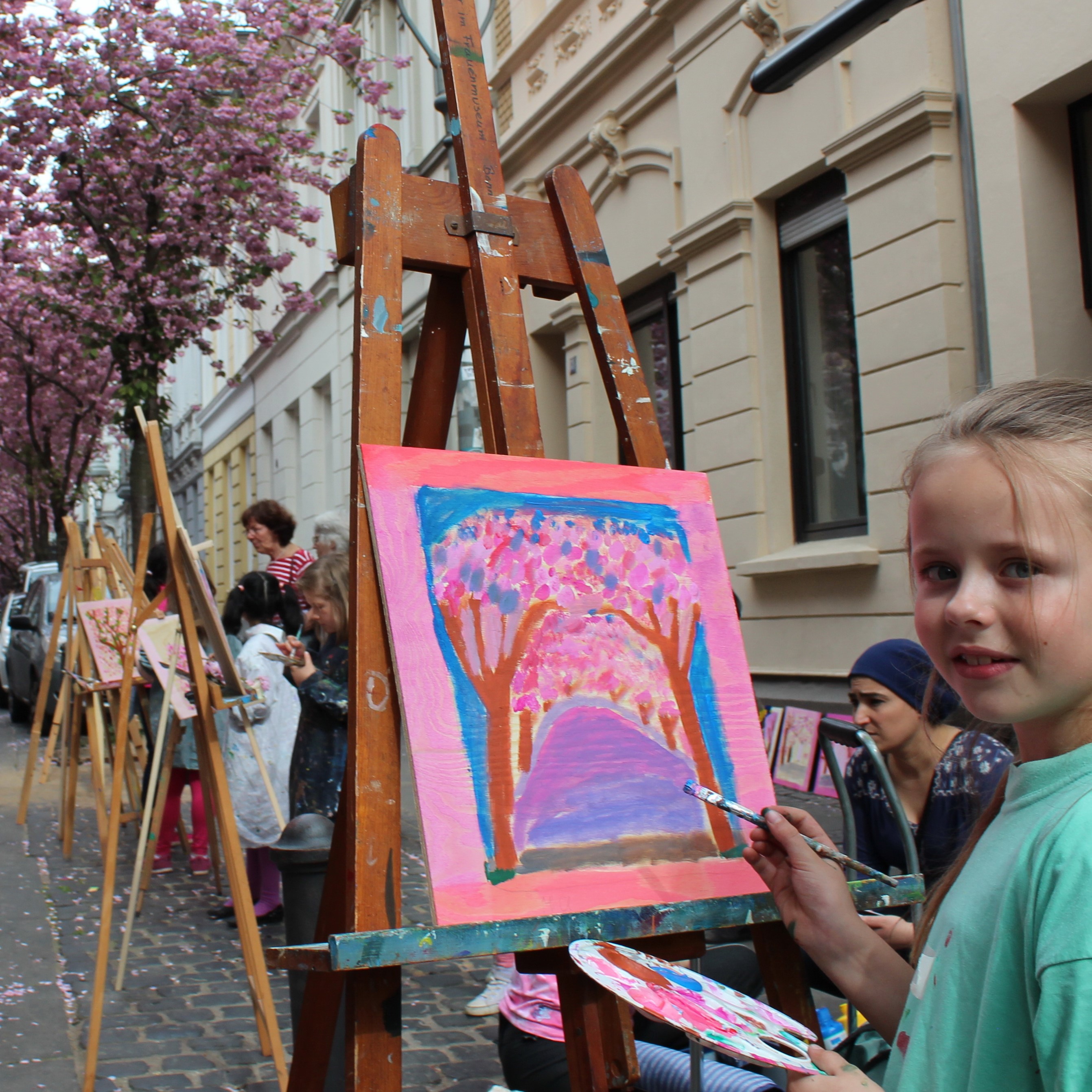 Kinder beim Malen auf der Heerstraße
